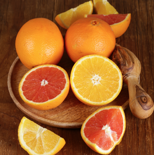 oranges on cutting board