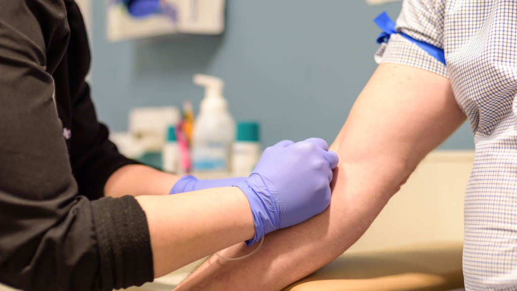 lady getting blood draw for leptin blood test