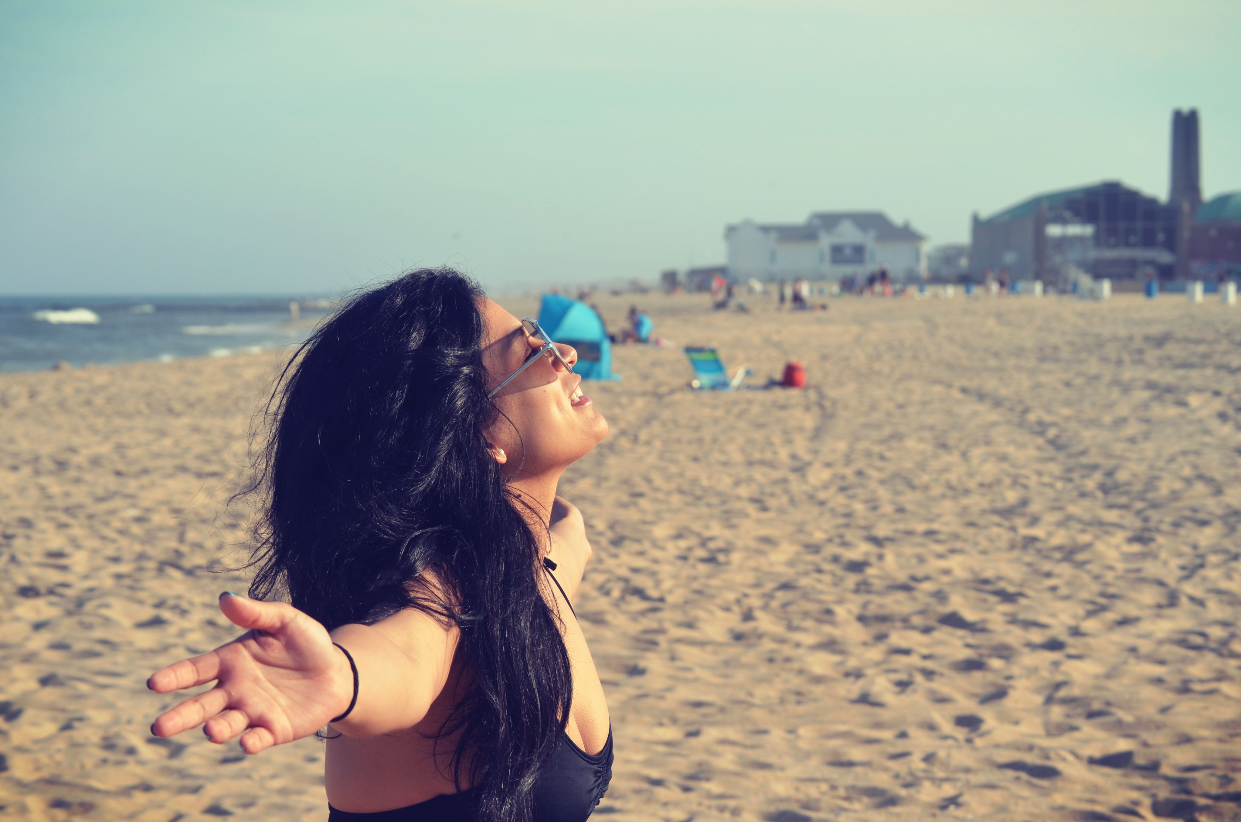Person spending time outdoors in sunlight, a natural source associated with Vitamin D production
